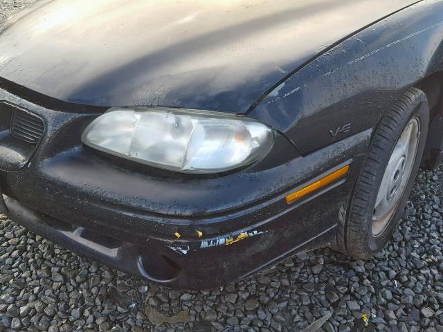 1G2NW52M3VC856081 - 1997 PONTIAC GRAND AM G BLACK photo 9