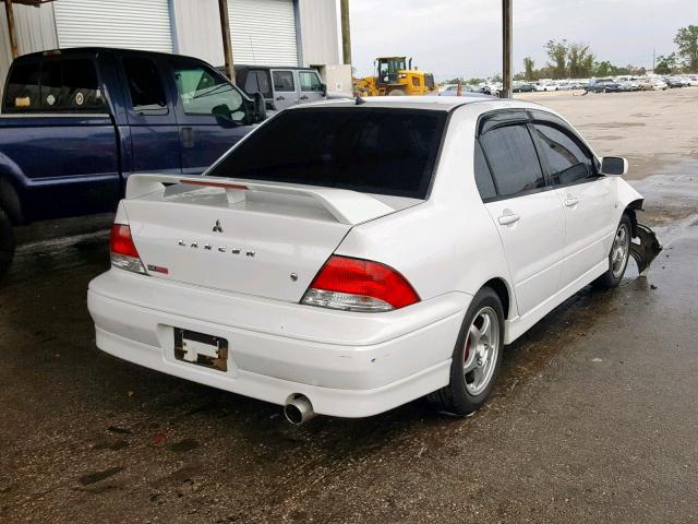 JA3AJ86EX2U026795 - 2002 MITSUBISHI LANCER OZ WHITE photo 4