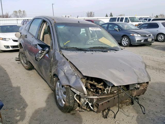 1FAFP34N55W221889 - 2005 FORD FOCUS ZX4 TAN photo 1