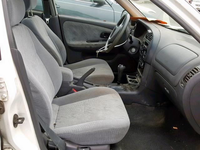 JA3AY26A7XU052672 - 1999 MITSUBISHI MIRAGE DE WHITE photo 5