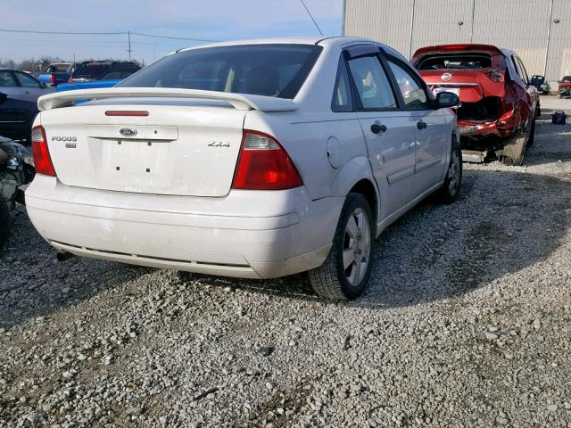 1FAFP34N56W190614 - 2006 FORD FOCUS ZX4 WHITE photo 4