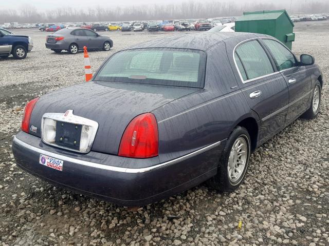 1LNFM82W8XY611349 - 1999 LINCOLN TOWN CAR S GRAY photo 4