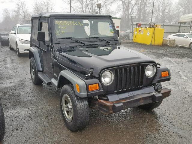 1J4FA29P52P750825 - 2002 JEEP WRANGLER / BLACK photo 1