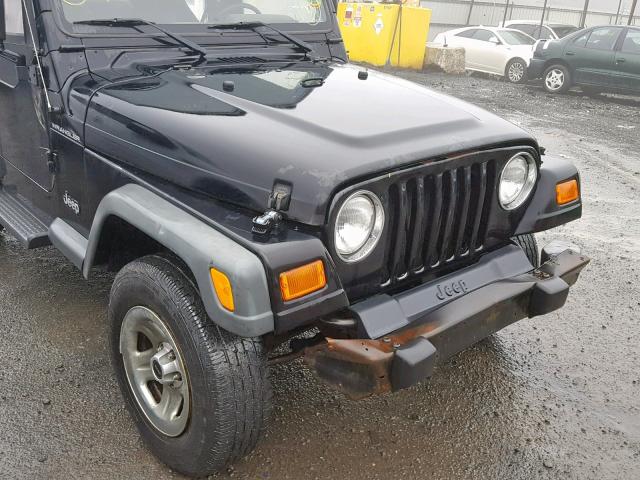 1J4FA29P52P750825 - 2002 JEEP WRANGLER / BLACK photo 9