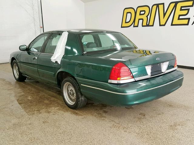 2FAFP74W4YX198775 - 2000 FORD CROWN VICT GREEN photo 3