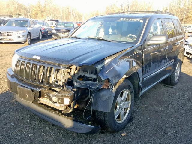 1J8GR48K57C579599 - 2007 JEEP GRAND CHER BLACK photo 2