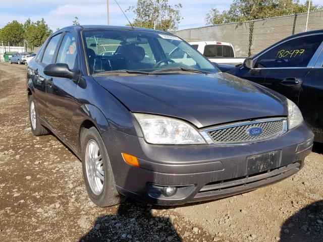 1FAHP34N85W296854 - 2005 FORD FOCUS ZX4 GRAY photo 1