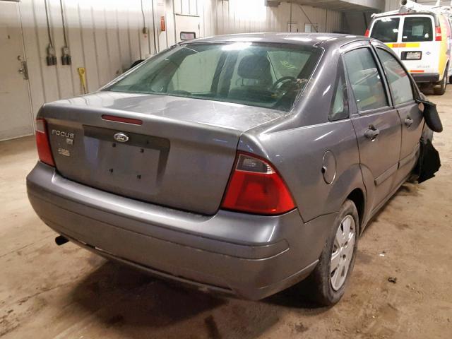 1FAFP34NX7W297059 - 2007 FORD FOCUS ZX4 GRAY photo 4