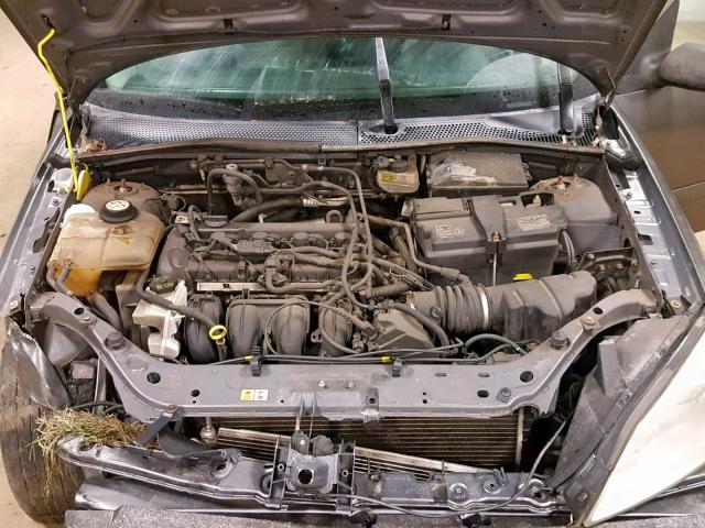 1FAFP34NX7W297059 - 2007 FORD FOCUS ZX4 GRAY photo 7