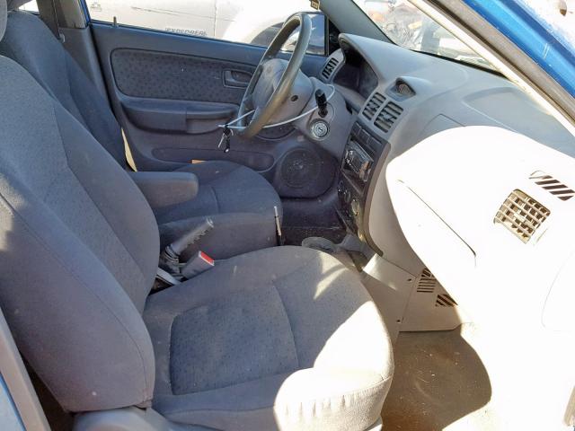 KNADC125746296206 - 2004 KIA RIO BLUE photo 5