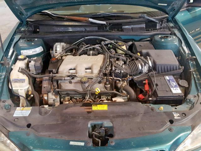 1G2NE52E2XM877982 - 1999 PONTIAC GRAND AM S GREEN photo 7