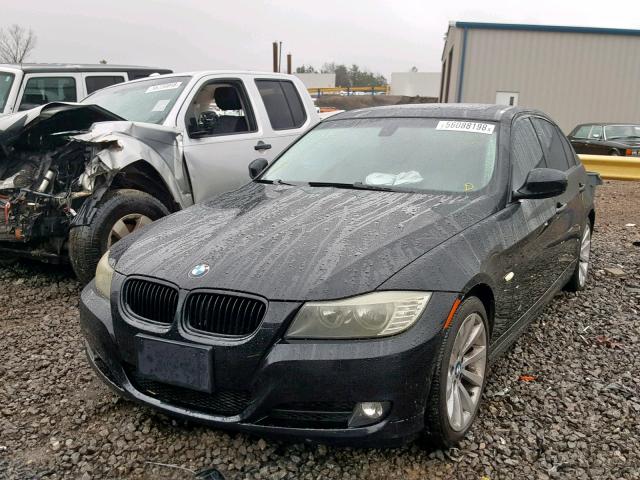 WBAPH57599NL79597 - 2009 BMW 328 I SULE BLACK photo 2