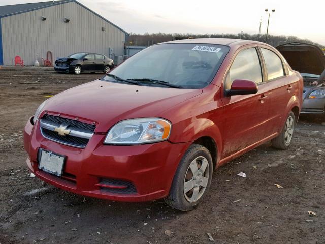 KL1TD5DE0BB224744 - 2011 CHEVROLET AVEO LS RED photo 2