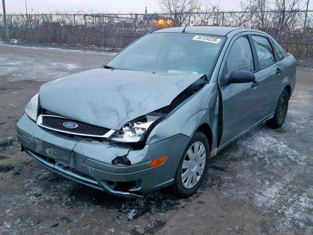 1FAFP34N35W258889 - 2005 FORD FOCUS ZX4 GREEN photo 2