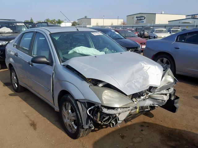 1FAHP38Z34W176648 - 2004 FORD FOCUS ZTS SILVER photo 1