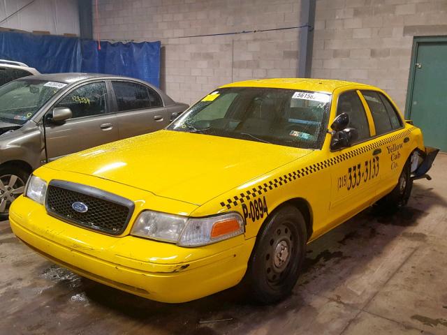 2FABP7BV5AX100206 - 2010 FORD CROWN VICT YELLOW photo 2