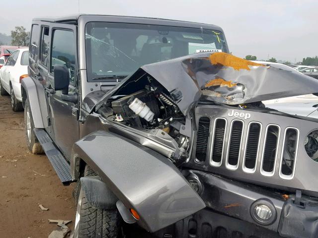 1C4HJWEG8JL894645 - 2018 JEEP WRANGLER U GRAY photo 1