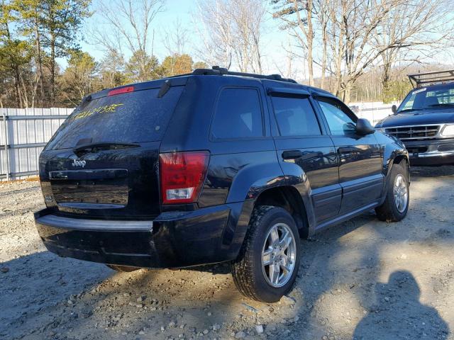 1J8HR48N06C267672 - 2006 JEEP GRAND CHER BLACK photo 4