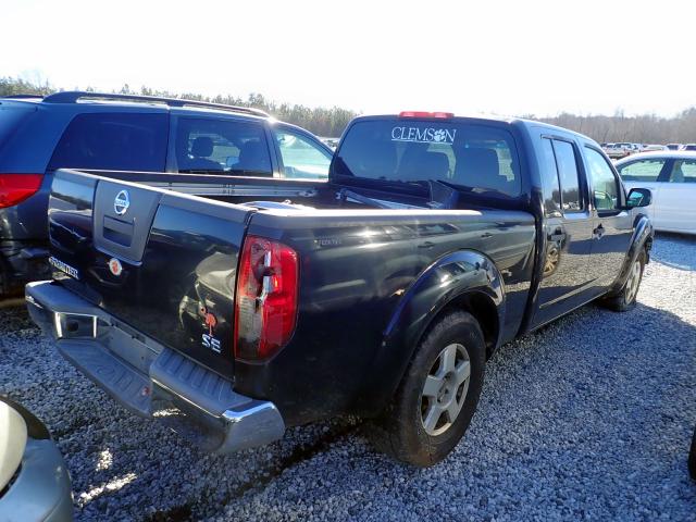 1N6AD09UX7C405514 - 2007 NISSAN FRONTIER C BLACK photo 4