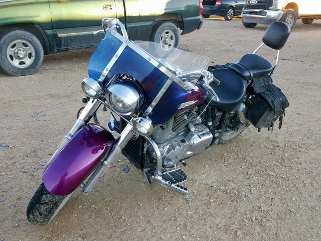 1HFSC52025A208303 - 2005 HONDA VT1300 S PURPLE photo 2