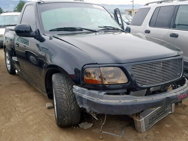 2FTRF07324CA07245 - 2004 FORD F150 SVT L BLACK photo 1