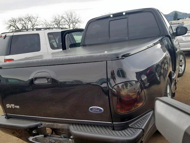 2FTRF07324CA07245 - 2004 FORD F150 SVT L BLACK photo 4