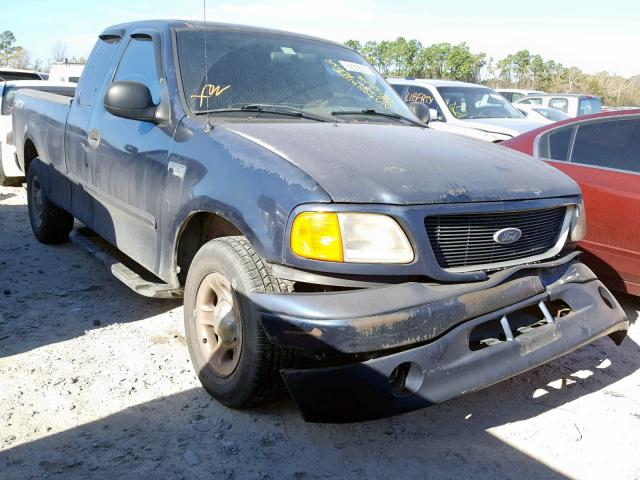 2FTRX17274CA10927 - 2004 FORD F-150 HERI BLUE photo 1