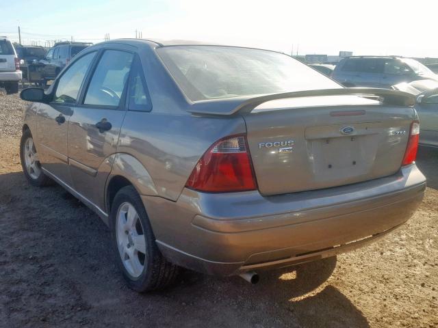 1FAFP34N35W176466 - 2005 FORD FOCUS ZX4 TAN photo 3