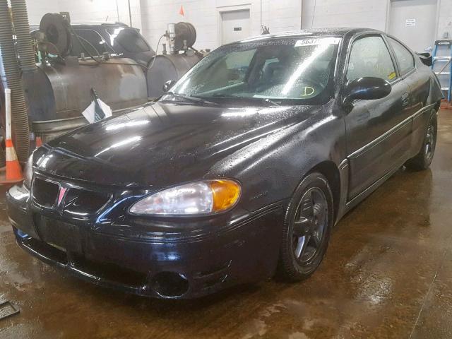 1G2NW12E12C313325 - 2002 PONTIAC GRAND AM G BLACK photo 2