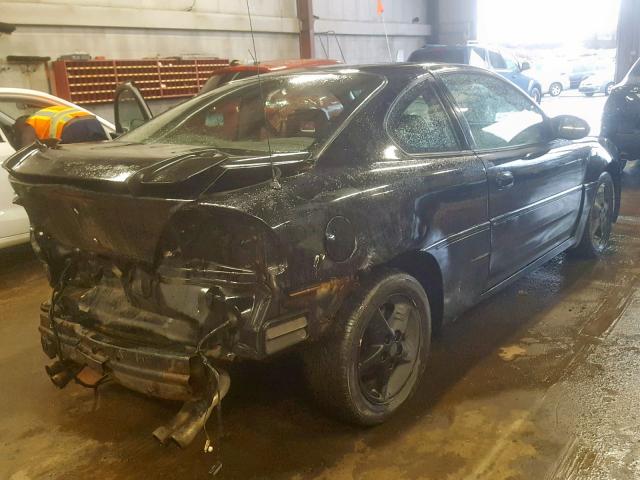 1G2NW12E12C313325 - 2002 PONTIAC GRAND AM G BLACK photo 4