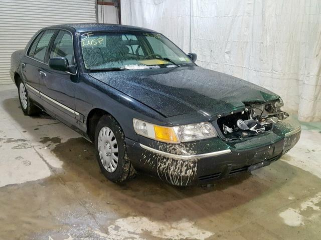 2MEFM74W9XX649960 - 1999 MERCURY GRAND MARQ GRAY photo 1