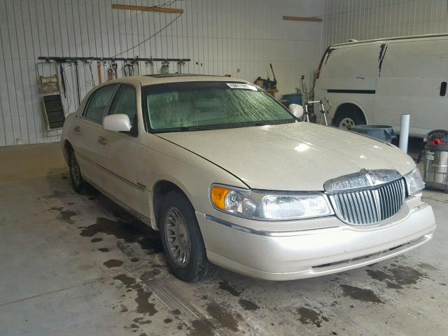 1LNHM83W4YY813503 - 2000 LINCOLN TOWN CAR C CREAM photo 1