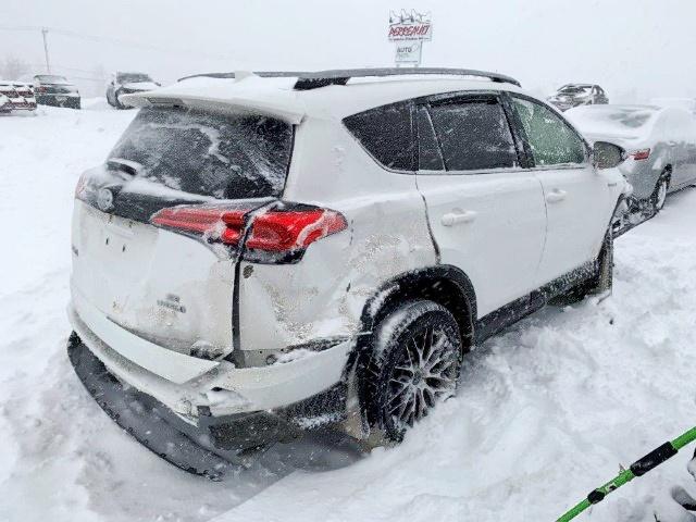 JTMJJREV7JD222779 - 2018 TOYOTA RAV4 HV SE WHITE photo 4