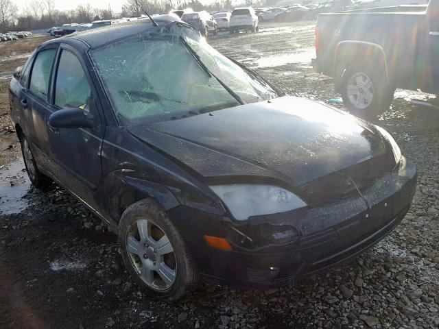 1FAHP34N77W275920 - 2007 FORD FOCUS ZX4 BLACK photo 1