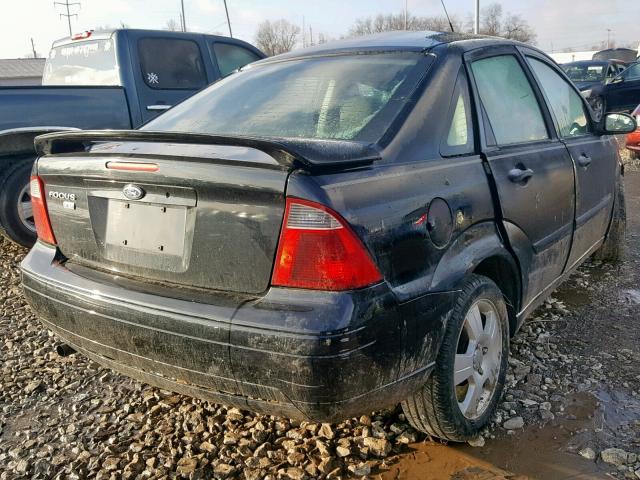 1FAHP34N77W275920 - 2007 FORD FOCUS ZX4 BLACK photo 4