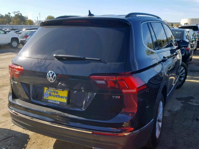 3VV3B7AX8JM159800 - 2018 VOLKSWAGEN TIGUAN SE BLACK photo 4