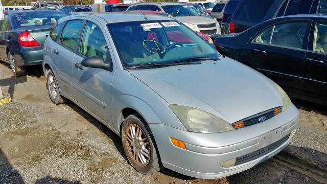 3FAFP37Z84R121432 - 2004 FORD FOCUS ZX5 GRAY photo 1