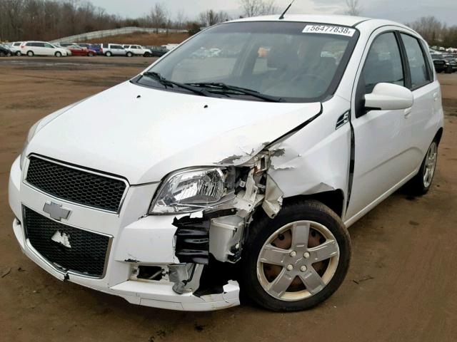 KL1TG6DE4BB189817 - 2011 CHEVROLET AVEO LT YELLOW photo 2