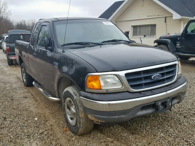 2FTRX18W34CA64257 - 2004 FORD F-150 HERI BLACK photo 1