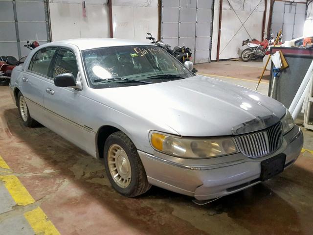 1LNHM81WXYY865186 - 2000 LINCOLN TOWN CAR E SILVER photo 1