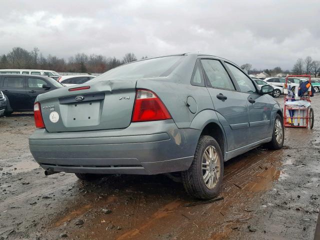 1FAFP34N65W266579 - 2005 FORD FOCUS ZX4 TURQUOISE photo 4