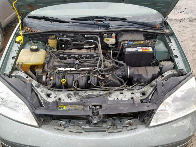 1FAFP34N65W266579 - 2005 FORD FOCUS ZX4 TURQUOISE photo 7