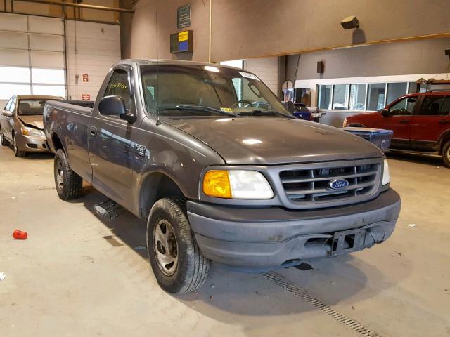 2FTRF18W24CA31852 - 2004 FORD F-150 HERI GRAY photo 1