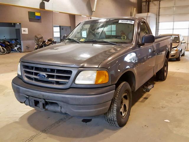 2FTRF18W24CA31852 - 2004 FORD F-150 HERI GRAY photo 2