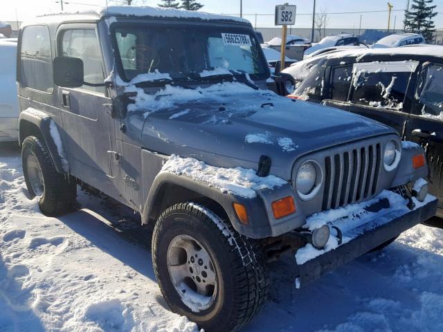 1J4FA49SXYP762025 - 2000 JEEP WRANGLER / SILVER photo 1