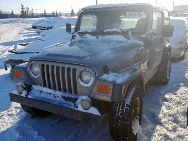 1J4FA49SXYP762025 - 2000 JEEP WRANGLER / SILVER photo 2