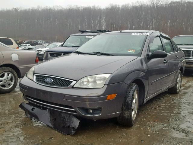 1FAFP34N85W183476 - 2005 FORD FOCUS ZX4 GRAY photo 2