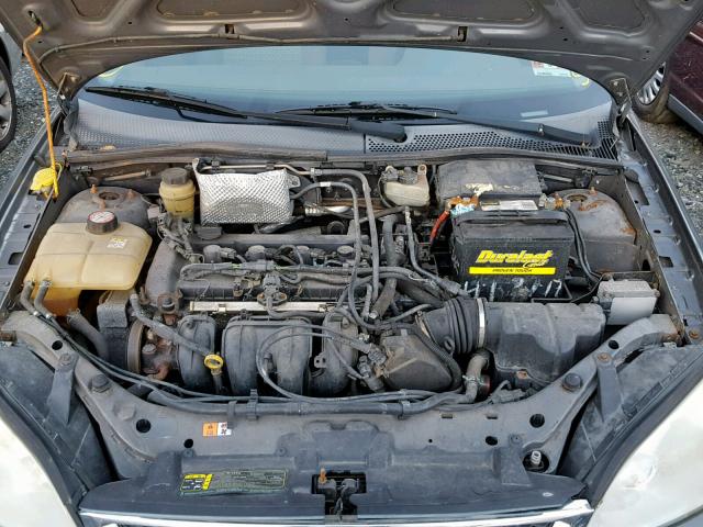 1FAFP34N85W183476 - 2005 FORD FOCUS ZX4 GRAY photo 7