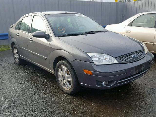 1FAFP38Z85W174130 - 2005 FORD FOCUS ZX4 GRAY photo 1
