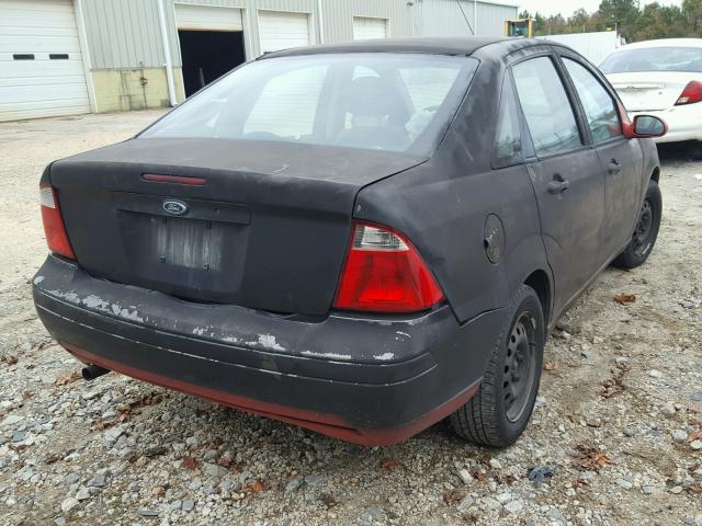 1FAFP34N97W140011 - 2007 FORD FOCUS ZX4 BLACK photo 4